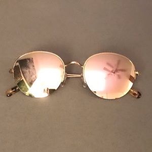 Gold frames sunglasses with pink lenses